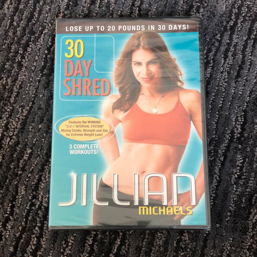 Jillian Michaels 30 day shred. New video. Never played.